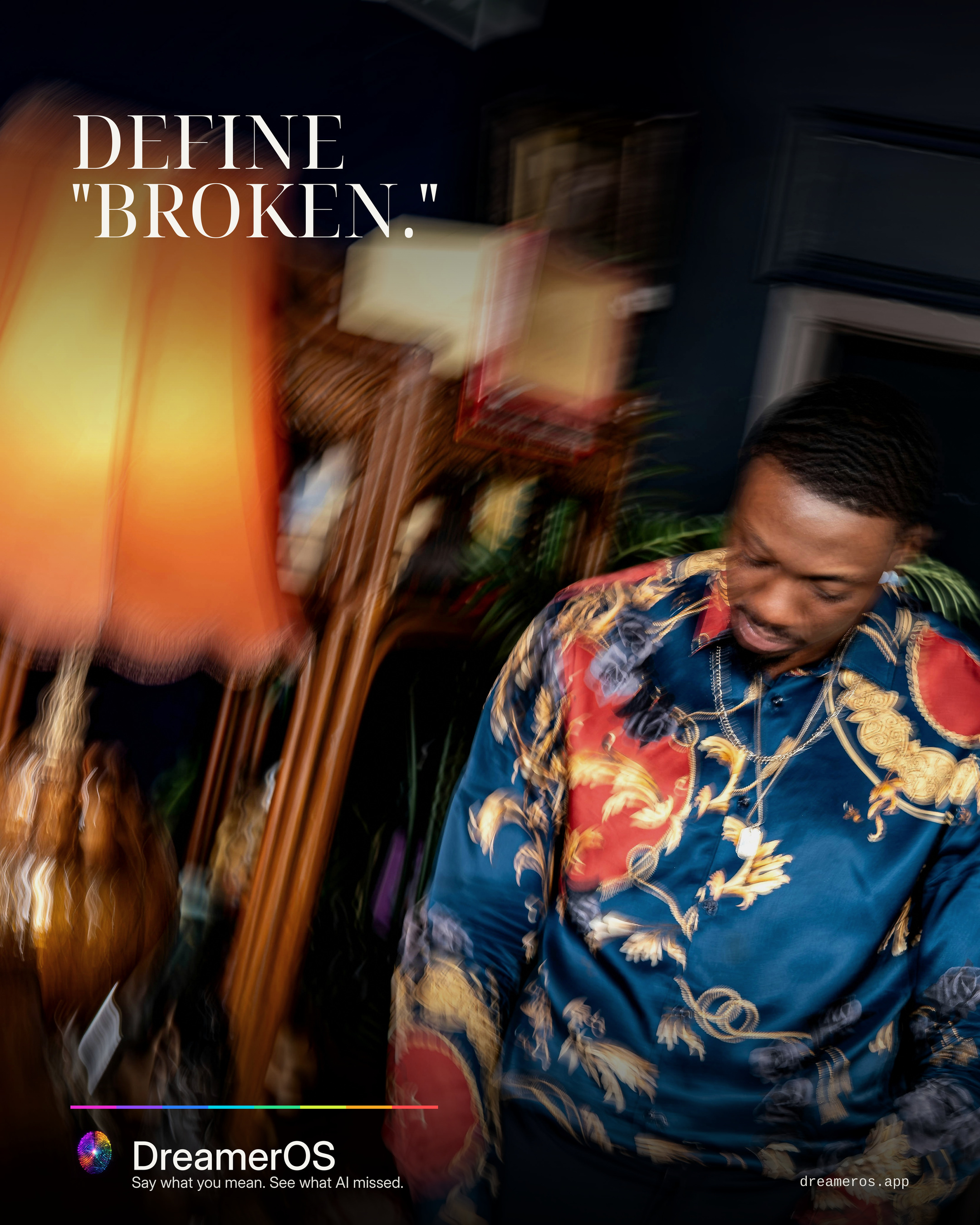 The same falling lamp and man appear under the headline, Define broken.